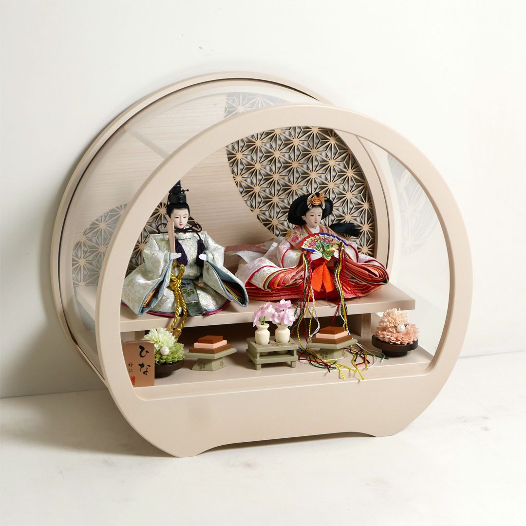 薄ピンクと薄緑の流水桜衣装雛人形アクリル円型ベージュケース飾り