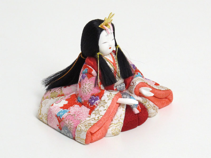 明るい色合いの桜柄衣装の木目込み人形