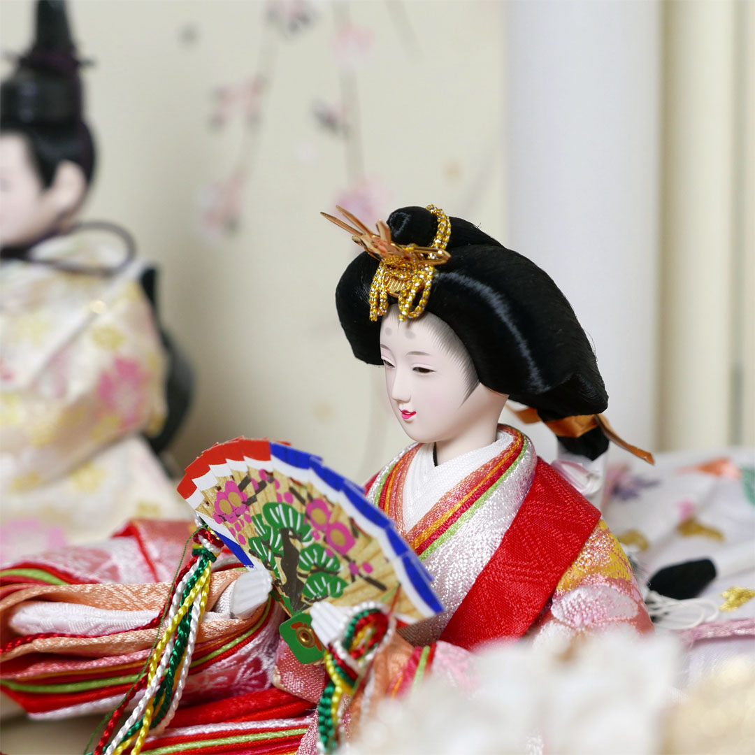 オレンジと黄色の桜柄衣装の雛人形月に桜段違い屏風収納飾り