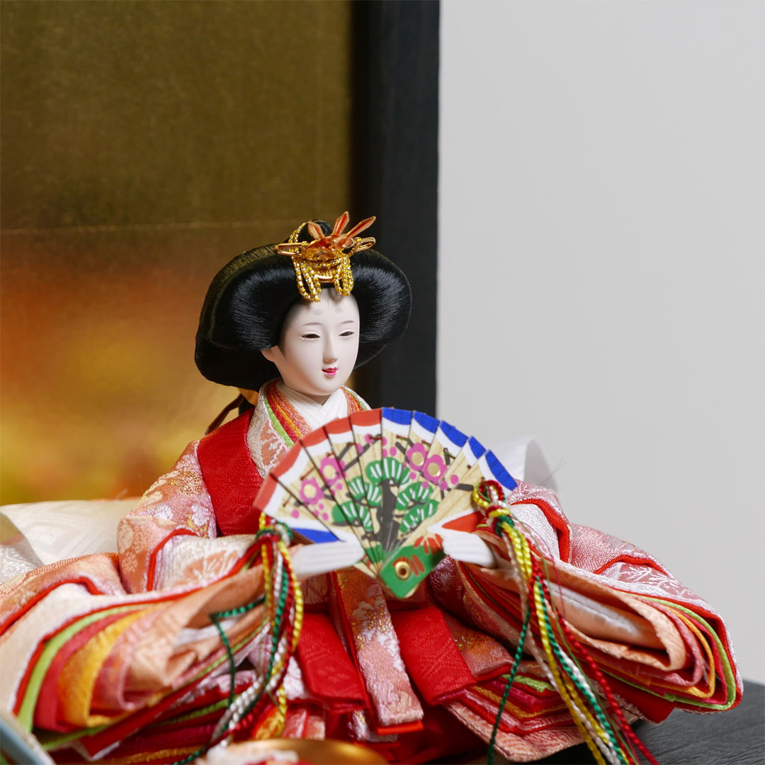オレンジと黄色の桜柄衣装の雛人形黒焼桐収納飾り