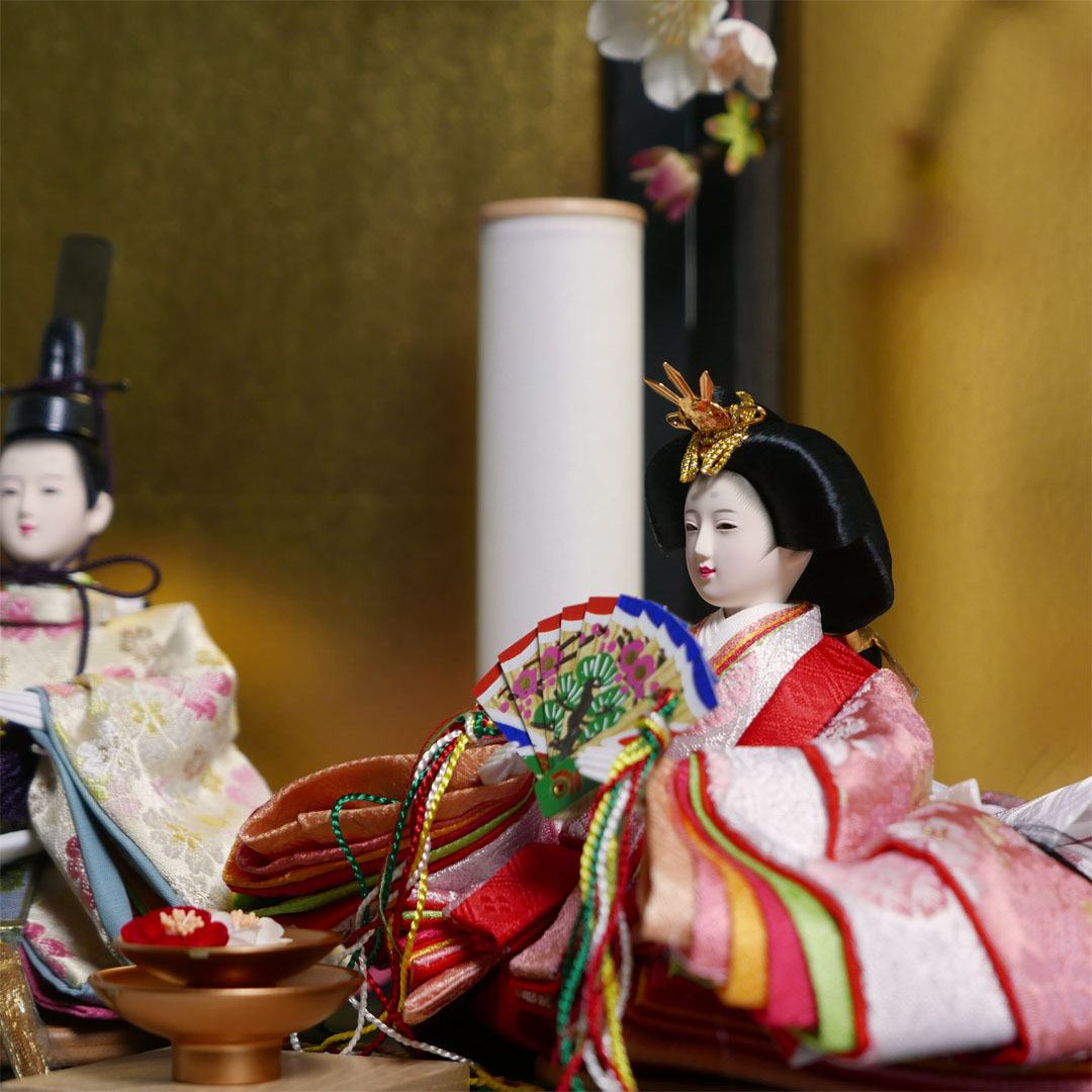 オレンジと黄色の桜柄衣装の雛人形黒焼桐収納飾り