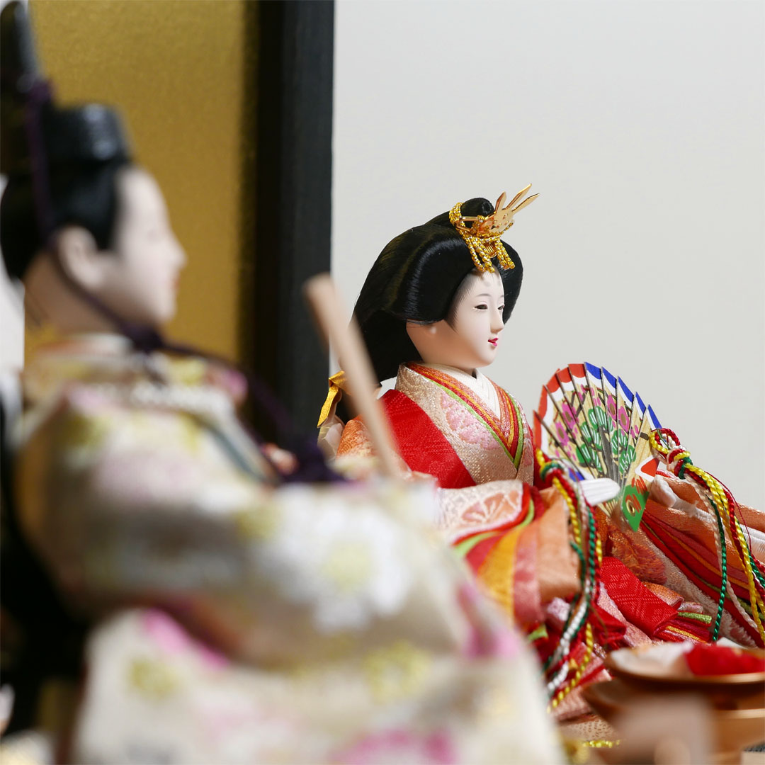 オレンジと黄色の桜柄衣装の雛人形黒焼桐収納飾り