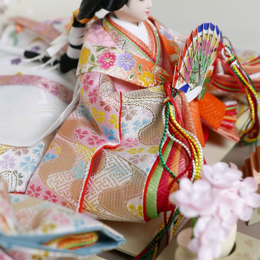 薄ピンクと白のキラキラ衣装雛人形月に桜段違い屏風収納飾り