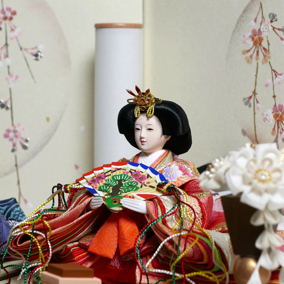 ピンクと青の有職文様衣装の雛人形月に桜段違い屏風収納飾り