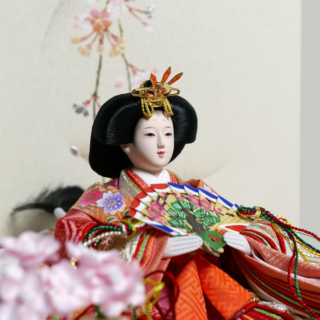 ピンクと青の有職文様衣装の雛人形月に桜段違い屏風収納飾り