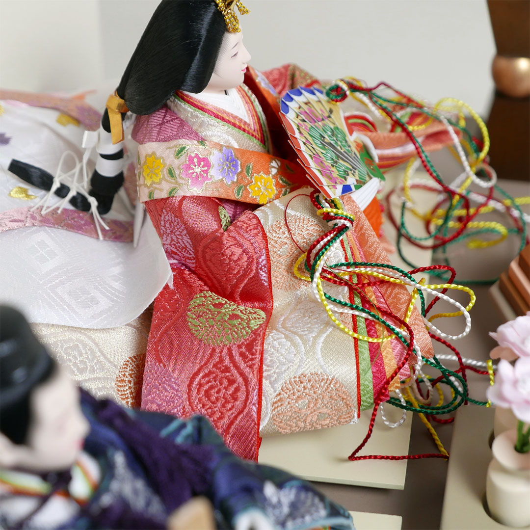 ピンクと青の有職文様衣装の雛人形月に桜段違い屏風収納飾り