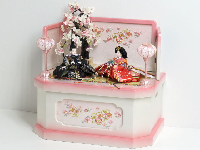 赤のお姫様と黒のお殿様の雛人形ぼかしピンク収納桜飾り